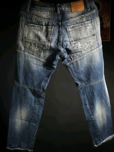 Distressed Blue Jeans