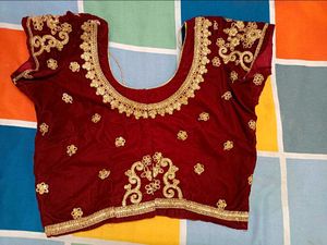 Exquisite Red &amp; Gold Embroidered Lehenga Choli