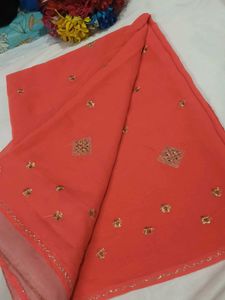 Elegant Orange Saree with Golden Embellishments