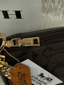 But 1 get one free Coach monogram shoulder bag
