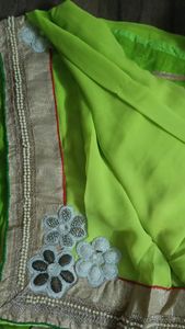 light green saree with white worked patch and golden lace with stitched blouse💚
