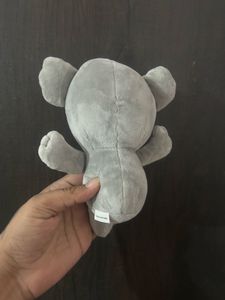 small gray koala plush toy featuring a fuzzy tex
