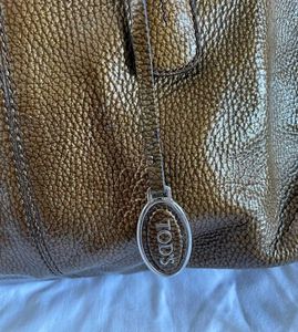 Tod's (Authentic)Camel Leather.