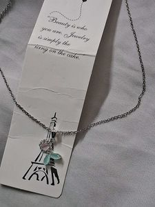 Elegant Silver Necklace With Flower Charm