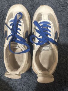 Stylish White and Blue Sneakers