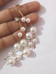Trendy White Pearls Long Drop Earrings.