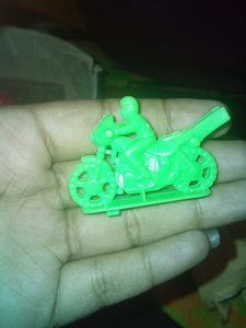 Vintage Toy Character with Wheels