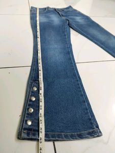 Flared Blue Jeans with Button Detail