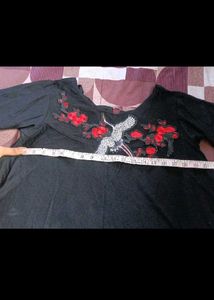 Chic Black Top with Crane Embroidery