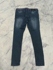 Distressed Denim Jeans.