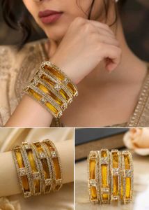 Elegant Gold Bangles with Amber Stones