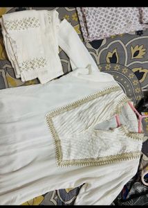 Elegant White Kurta with Gold Trim