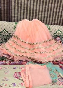 Elegant Peach Layered Lehenga Choli with Dupatta