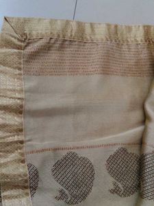 Elegant Beige Saree with Subtle Motifs
