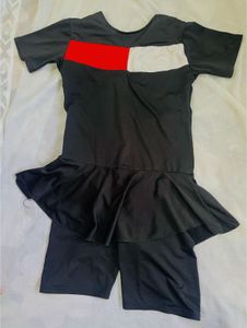 Black Swimsuit with Skirt