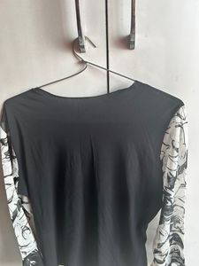 Black Top With Net Design Full Sleeves Net