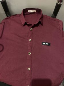 Boys plain maroon half sleeve shirt.