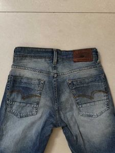 Distressed Blue Denim Jeans