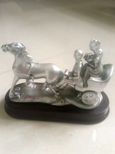 Cute Couple on chariot Statue