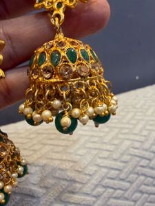 Exquisite Gold Plated Jhumka Earrings with Green S