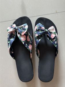 Floral Bow Flip Flops