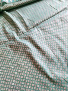 Beautiful Teal dress material with woven silk work