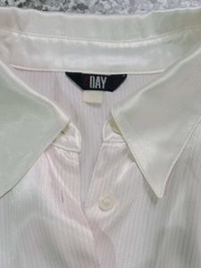 Elegant White and Pink button down shirt.