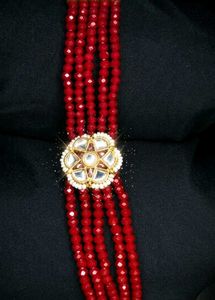 Red Beaded Bracelet with Kundan Charm