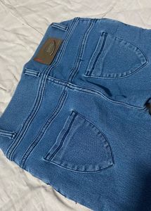 Ripped Knee Denim Jeans