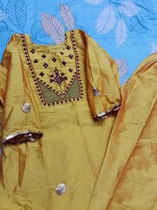 Elegant Yellow Kurta Set with Intricate Embroidery