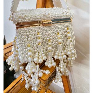 Exquisite Pearl Embellished Clutch Bag