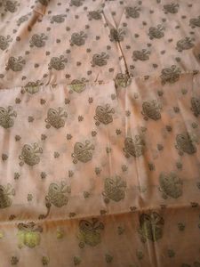 Elegant Peach Saree with Intricate Gold Print