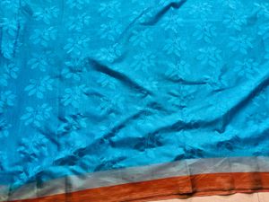 Elegant Teal Saree with Leaf Motif