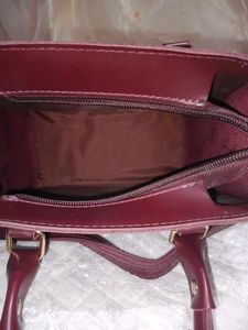 Elegant Maroon Handbag with Shoulder Strap