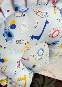 Rai Baby Pillow with Animal Prints.
