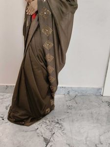 Elegant Brown Embellished Saree
