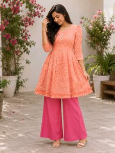 orange peplum Top