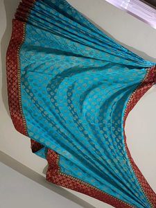 Banarasi SkyBlue Maroon And Gold With Stone Saree