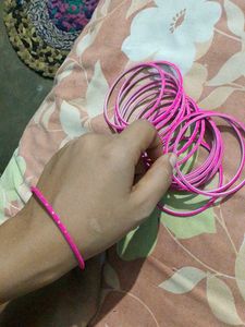 Vibrant Pink Bangles with Gold Accents
