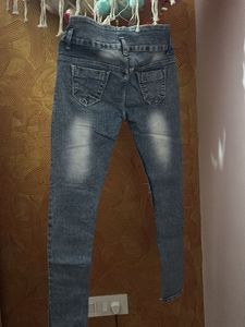 Distressed Denim Jeans with 'Girl' Graphic