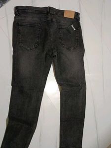Distressed Black Jeans with Star Detail