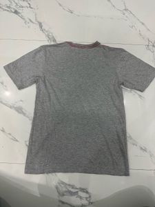 Y2K Grey graphic tee with bold sekeleton artwork a