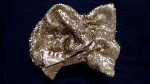 Golden sequined potli