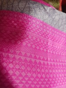 Vibrant Pink Saree with Intricate Pattern