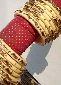 Elegant Cream Bangles with Gold Embellishments