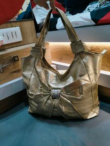 Chic Gold Tote Bag with Bow Accent