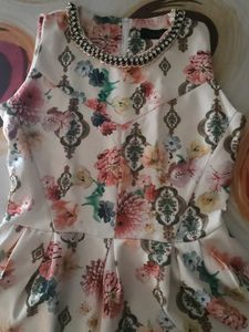 Floral Print Embellished peplum top
