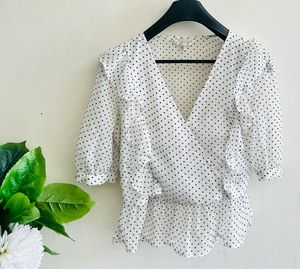 White Polka Dot Wrap Peplum Top