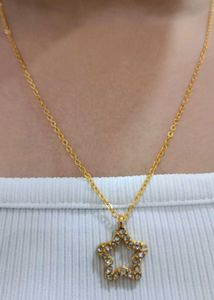 Gold Star Pendant Necklace