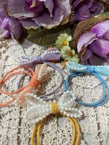 Hair ties, Rubber band with cute bow on top.